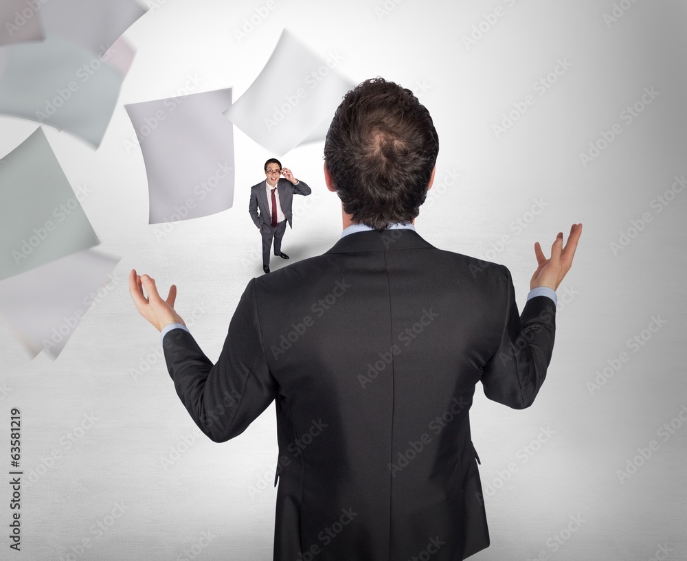 Poster Composite image of gesturing businessman with tiny businessman