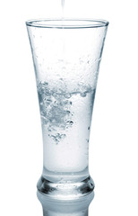 water splashing from glass isolated on white background