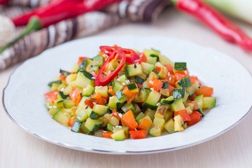 Fried vegetables cubes, Ratatouille, zucchini, red pepper