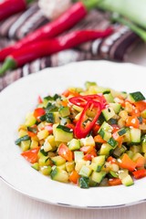 Fried vegetables cubes, Ratatouille, zucchini, red pepper