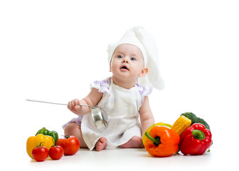 funny baby cook with vegetables