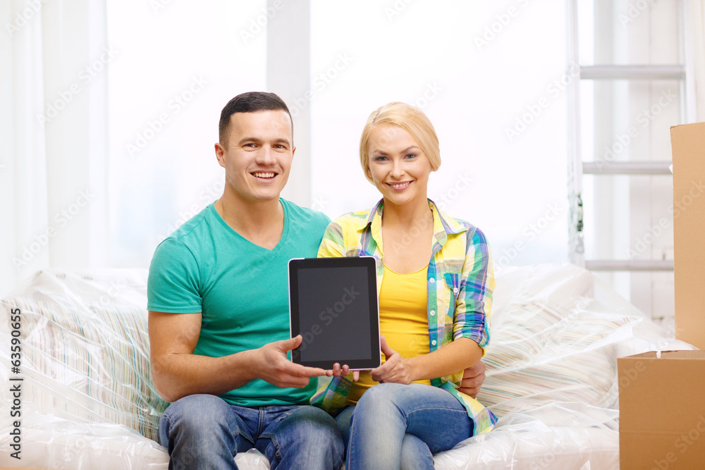 Sticker couple relaxing on sofa with tablet pc in new home