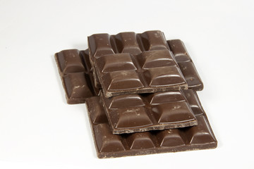 Stacked Broken Slab of Dark Chocolate Squares
