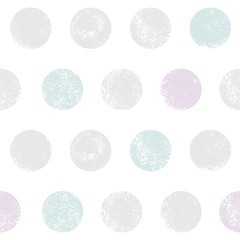 Seamless pattern of scribbled circles in pale colors.