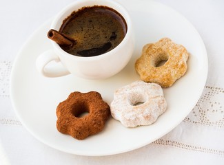 Cup of coffee and some cookies