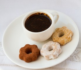 Cup of coffee and some cookies