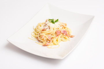 Spaghetti Carbonara Plate With Baked Ham And Parmesan