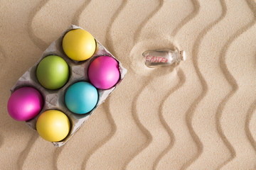 Fototapeta na wymiar Easter egg hunt at the beach