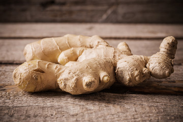 Ginger on wooden background