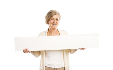 Senior woman with advertising board