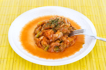 Spanish pisto food with onions, pepper, zucchini and tomatoe