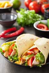 mexican tortilla wrap with chicken breast and vegetables