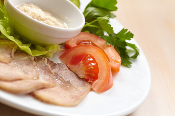 Slices of boiled beef tongue