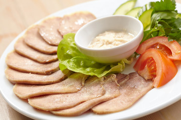 Slices of boiled beef tongue