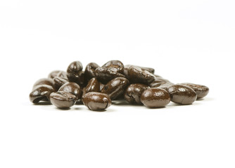 Brown coffee beans isolated on white background