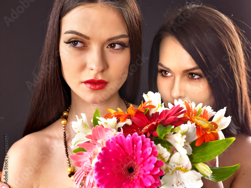 Two Sexy Lesbian Women With Flower Photo Libre De Droits Sur La Banque Dimages
