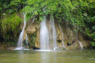 Fototapeta na wymiar beautiful waterfall in the National Park Thailand.