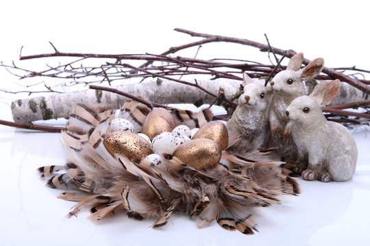 Easter bunny and golden eggs