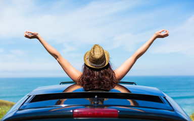 Woman on car travel freedom enjoying freedom