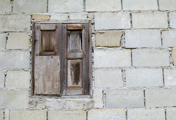 Obraz na płótnie Canvas background of old brick wall with vintage window