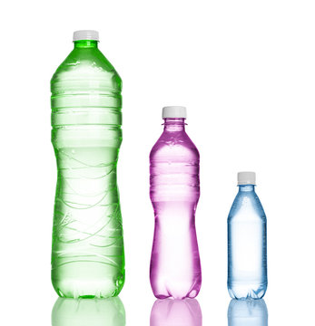 three plastic bottles isolated on white