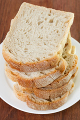 bread on plate on dark background