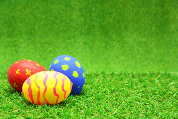 Easter eggs on grass background