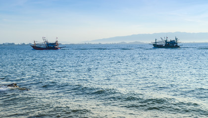 Sunrise over the sea and fishing boat in countryside,Hua Hin-Thailand