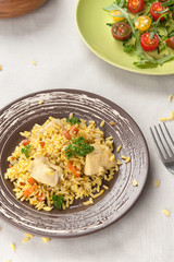 pilaf with chicken and vegetable salad