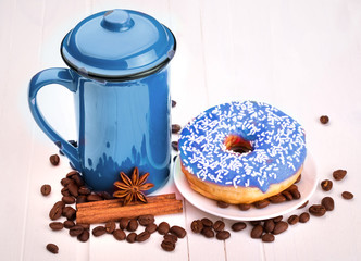 Tasty donut with a cup of coffee
