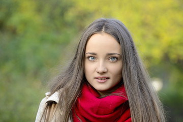 Portrait of a smiling beautiful young woman with blond hair