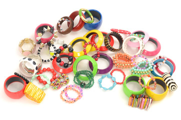 Close up on many, diversed colorful bracelets,beeing fashionable