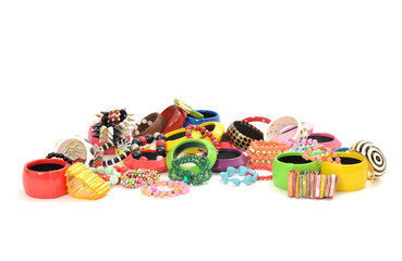Close up on many, diversed colorful bracelets,beeing fashionable