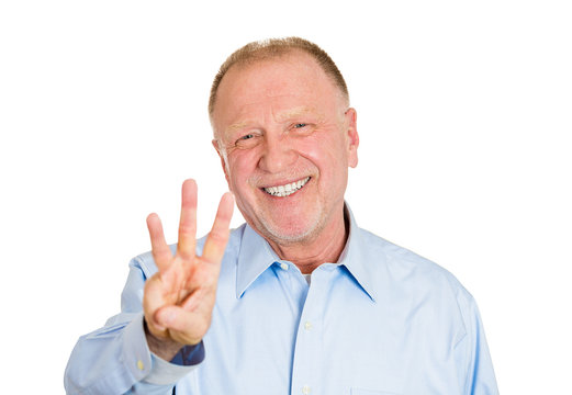 Three times hand gesture. Happy senior business man 