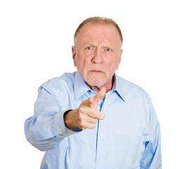 Portrait serious, upset older man pointing fingers at someone