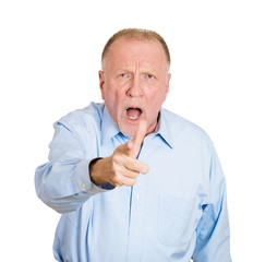 Portrait serious, upset older man pointing fingers at someone