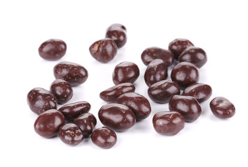 Dark brown dragee in chocolate covered.