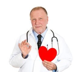 Doctor holding heart, friendly guy, reassures patient
