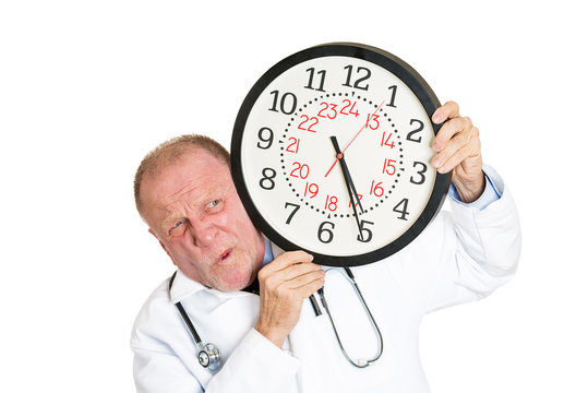 Senior, elderly male doctor pressured by time