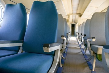 Interior of an airplane with many seats