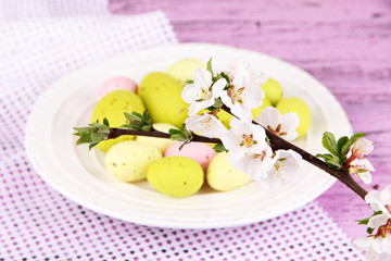 Composition with Easter eggs and blooming branches