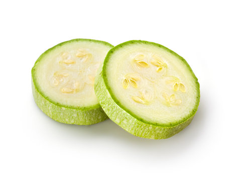 Sliced zucchini isolated on white. Courgette