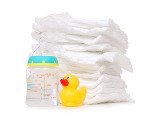 child stack of diapers bottle with water duck