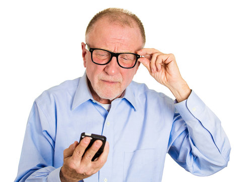 Blind old man. Headshot aging guy has difficulty reading  text