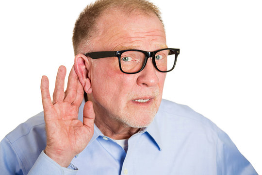 What did you say? Portrait senior man with hearing difficulties