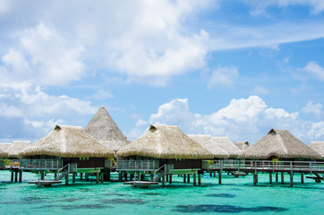 Luxury overwater bungalows with view of Pacific Ocean