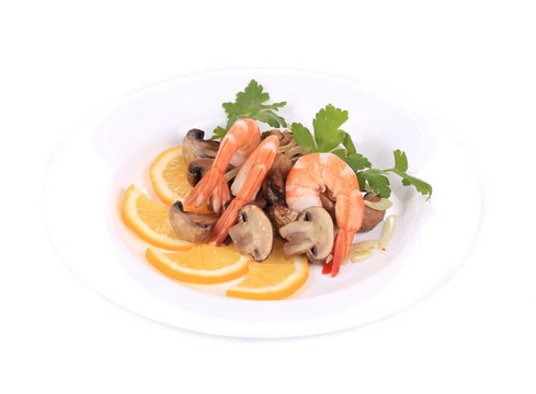 Shrimp salad with lemons and mushrooms.