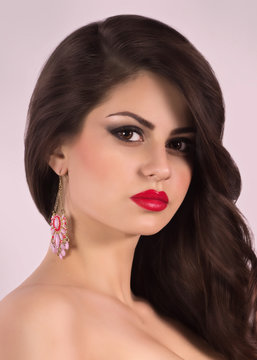 Portrait of beautiful young woman with makeup