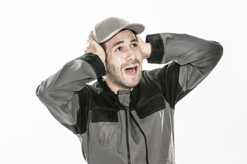 portrait close-up of an expressive man with workwear on isolated