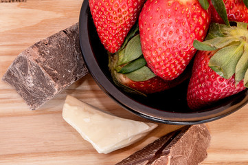 Strawberries and Chocolate in a bowl on the right